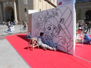Danjer pintando la obra 'Baile de Máscaras'